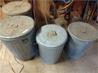 Four Galvanized Trash Cans with Lids