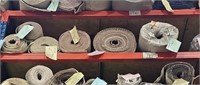Nine rolls of older stock carpet