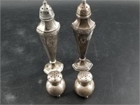 2 Pairs of salt and pepper shakers, 1 pair is ster