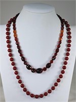 Two Bakelite Necklaces: Faceted Cherry Amber