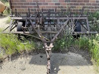 Old 10 foot field cultivator,flat tires