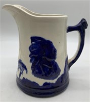 Old Sleepy Eye pottery pitcher