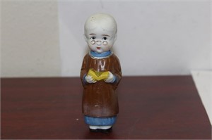 A Japanese Ceramic Figurine