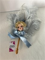 Feather Fan with Doll Head