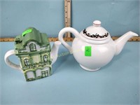 Two teapots one has some cracks