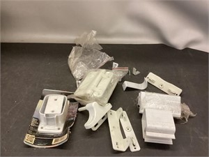 Assortment of plastic hinges and brackets