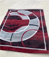 RED/ BLACK RUG- 5.3FT X 6.9FT