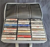 Cassette tapes in slft sided storage case.