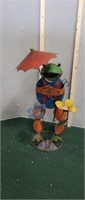 Custom built 36 in metal art frog in the rain