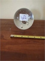 Heavy glass paperweight with bubbles