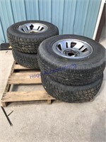 SET OF 4 TIRES ON RIMS, 235/75R15