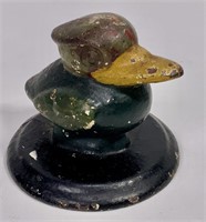 Cast iron paperweight, cartoon duck, 3" dia. base,