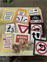 Big lot of laminated traffic signs and winnie the