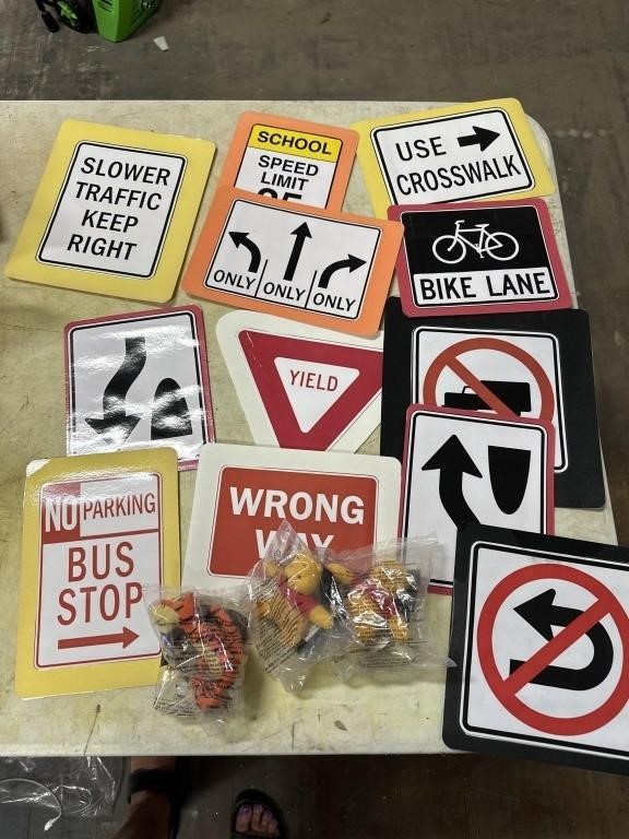 Big lot of laminated traffic signs and winnie the