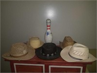 Lot of hats and bowling pin