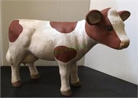 Large painted ceramic cow figure measuring 12