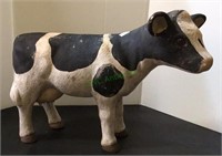 Large painted ceramic cow figures measuring 12
