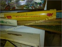 Lot of yard sticks and canes
