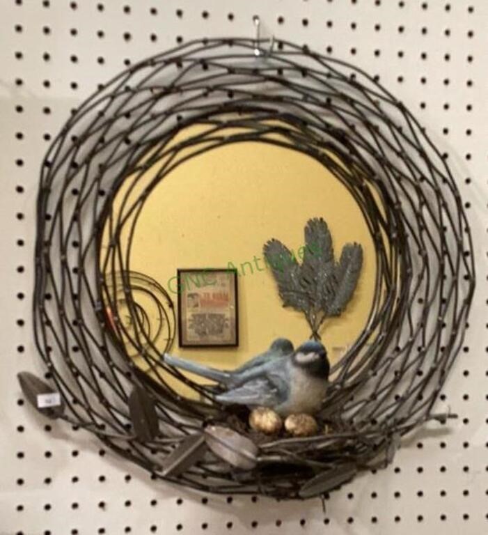 Beautiful round mirror with wire surround and a