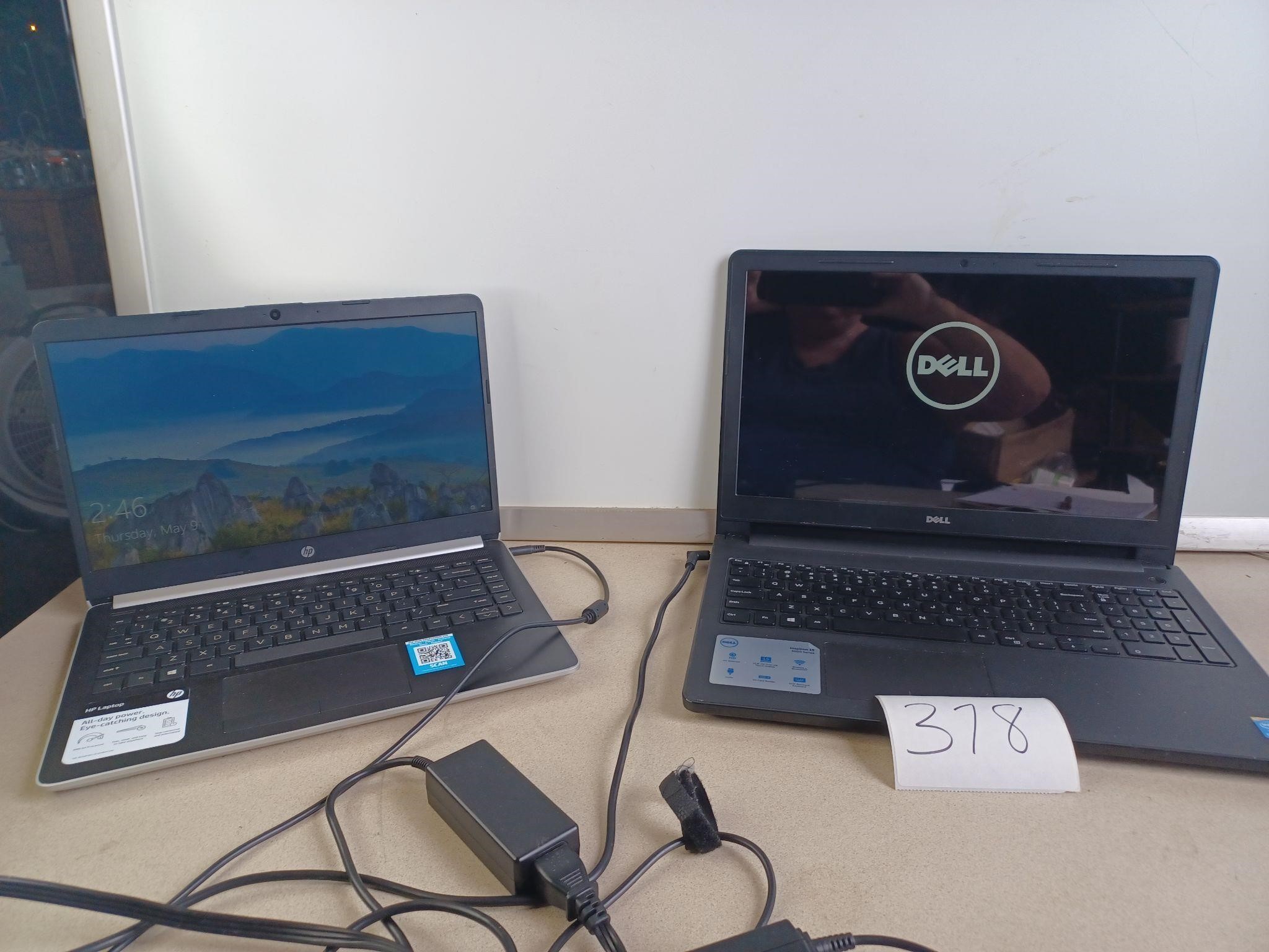 LOT OF 2 LAPTOPS WITH CORDS.  HP LAPTOP AND DELL.