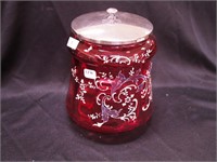 Vintage cranberry cracker jar with enameled