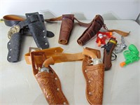 Old Toy Holsters and Toy Guns, some with damage -