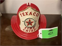 A toy Texaco, fire, chief helmet