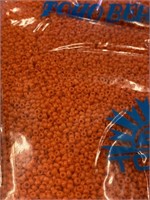 Toho 10/0 glass round seed beads. Opaque orange