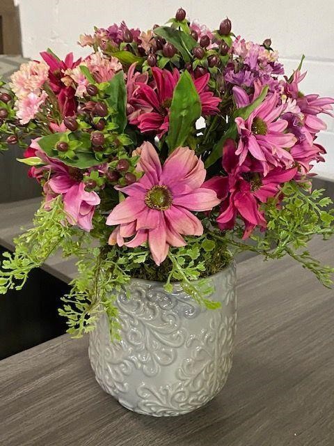 Pink floral arrangement, gray vase aritificial