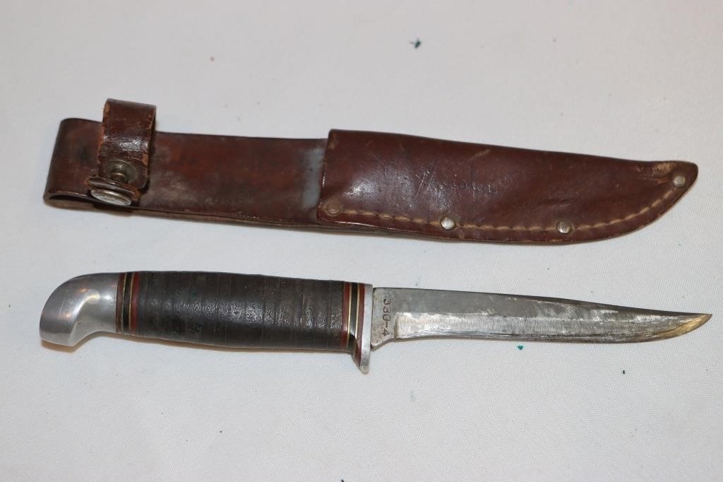 Sold at Auction: CUTCO CUTLERY SPORTSMAN'S KNIFE WITH SHEATH