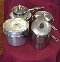 Assortment of pots, pans, lids, strainers,