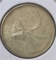 Silver 1966 Canadian quarter