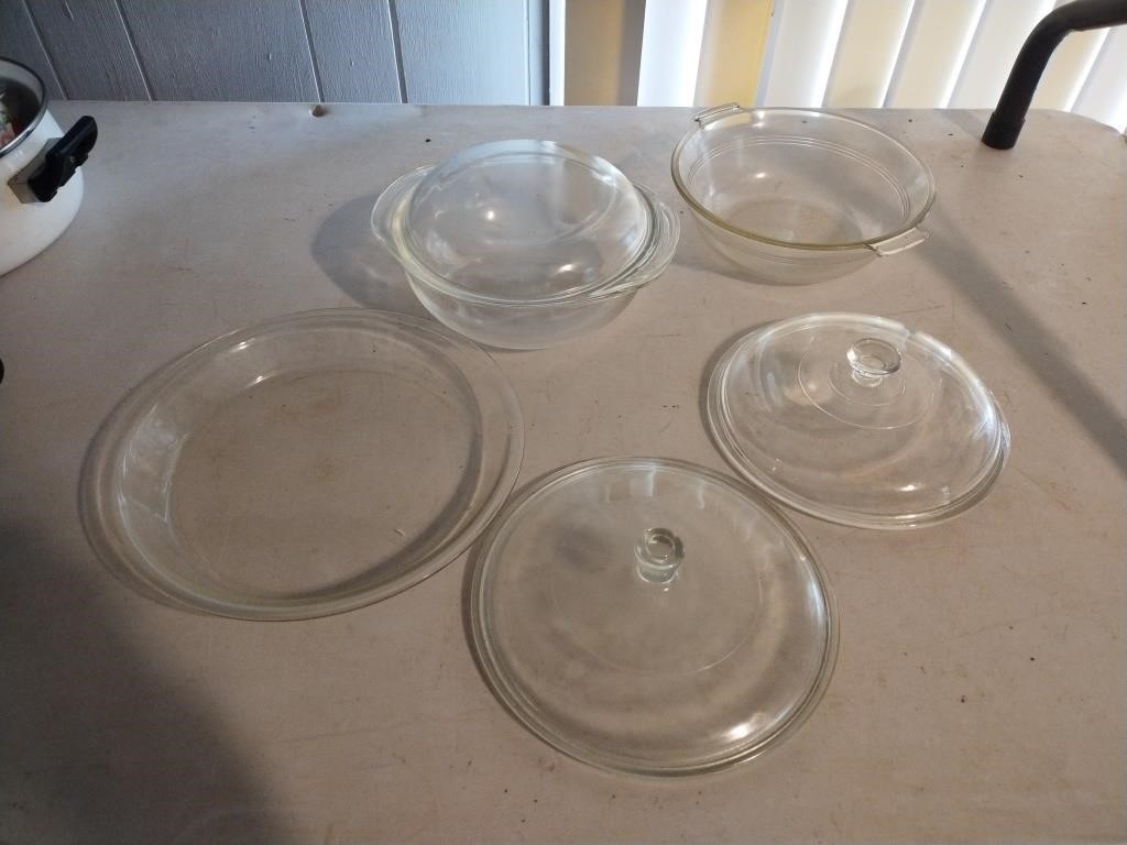 Glass casserole dishes, lids and a pie dish