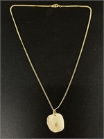 Ancient walrus ivory pendant with small gold nugge