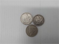 (2) Morgan and (1) Peace silver dollars