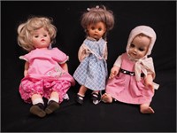 Three vintage dolls: one hard plastic, two