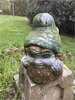 Small concrete gnome, weathered
