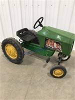 Green pedal tractor