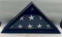 Flag in display case (name plate removed)