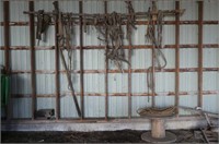 Harness on Wall with Rope and Wooden Spool