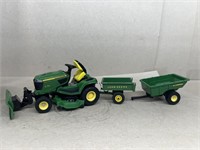 John Deere X758 lawnmower with blade and trailers