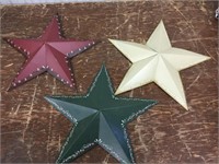 Three decorative metal stars