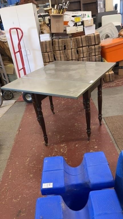 Antique Drop Leaf metal covered Table on Casters