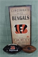 Cincinnati Bengals canvas print and two footballs;