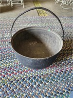 Cast iron footed cauldron with handle