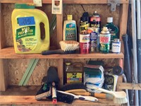 Assorted outdoor garden tools, paint sticks