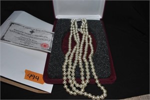 Camrose and Kross triple pearl necklace