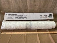 Overspray protective sheeting on a roll (partial