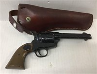 FAUX TOY CAST REVOLVER IN LEATHER CASE
