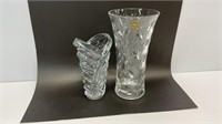 (2) crystal like vases, 9’’ and 11.5’’